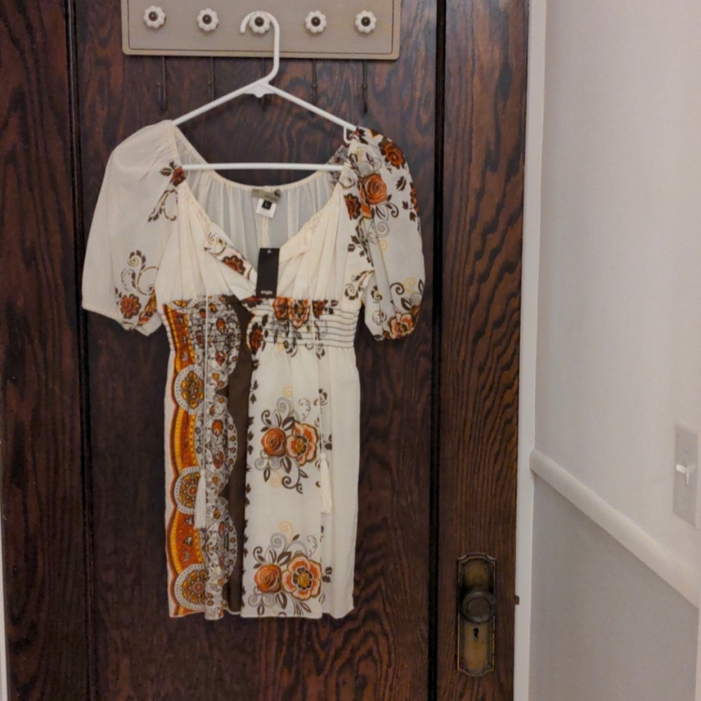 Floral Top with front tassels by single